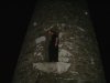 hamish having climbed to the doorway of the round tower